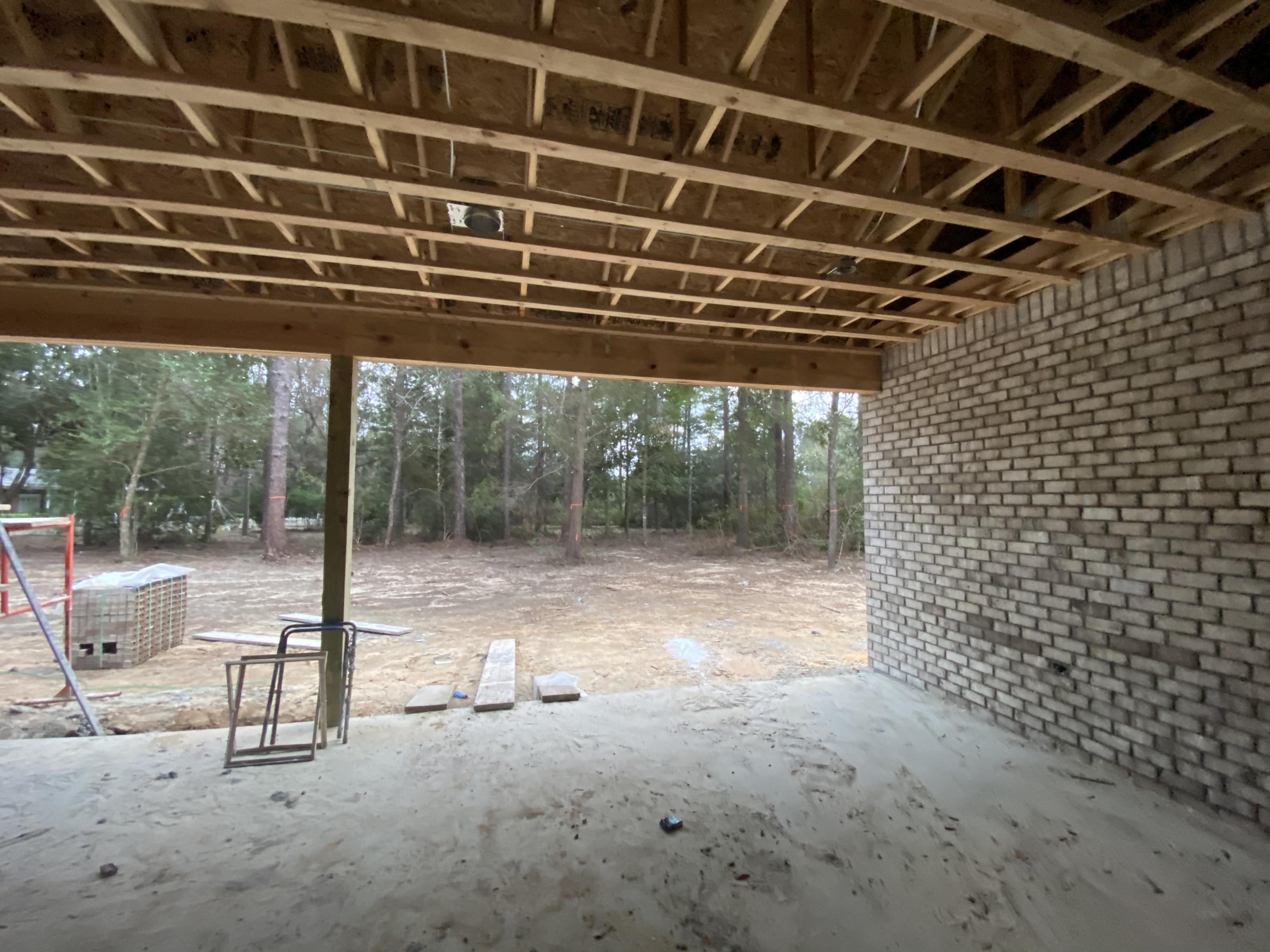 6080 Carina Road Crestview, FL 32539 - Photo 13 of 14 a view of a porch with furniture and a gate