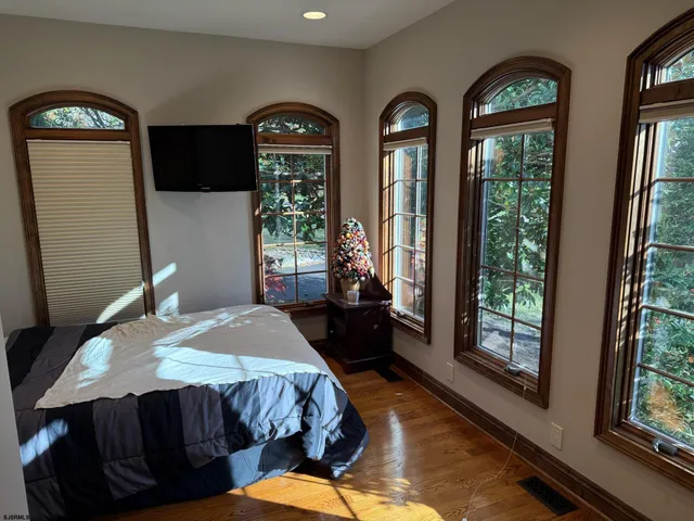 a view of staircase with large windows