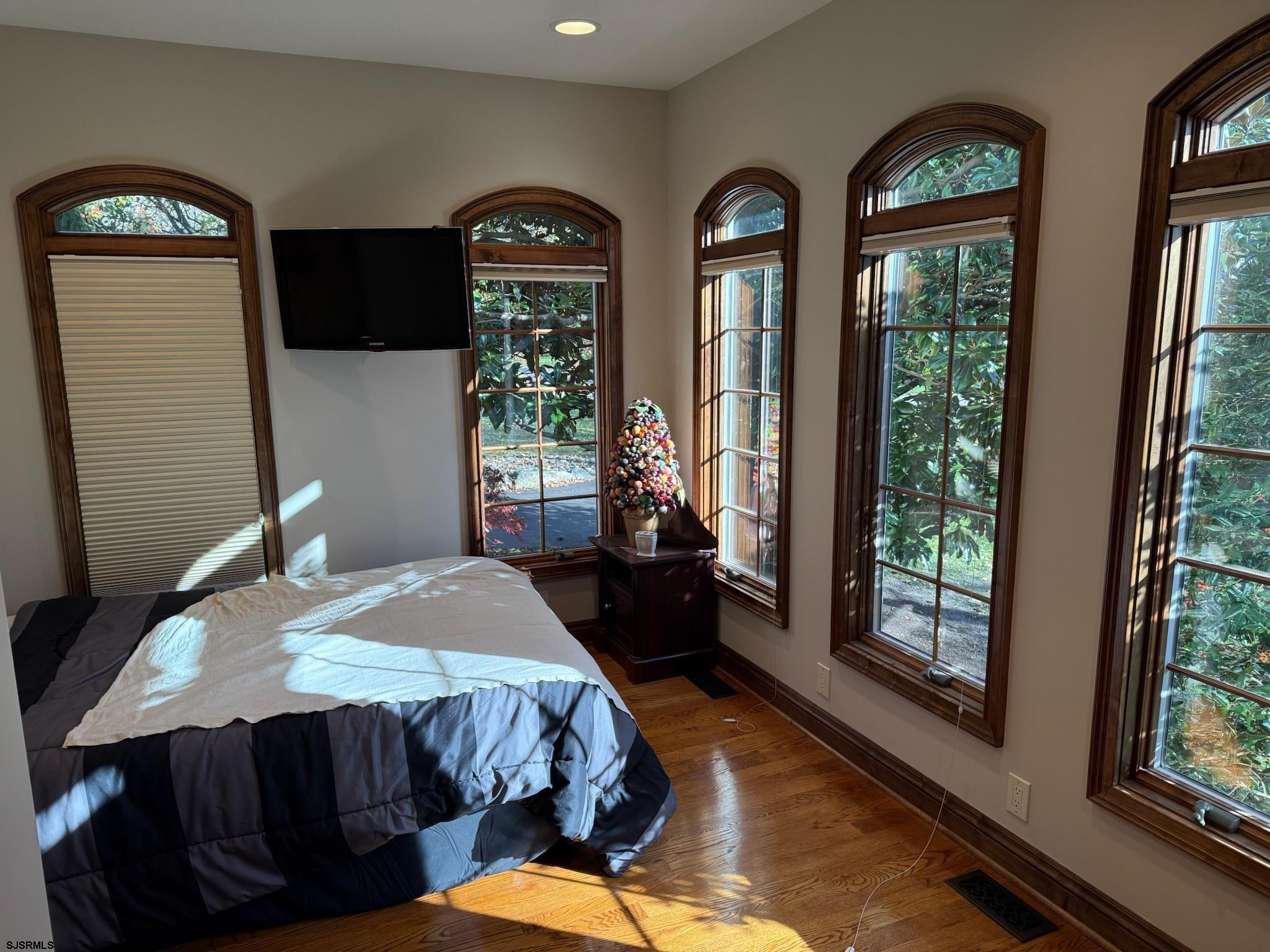 225 Old River Road Mays Landing, NJ 08330 - Photo 32 of 97 a bedroom with a bed a dresser and mirror