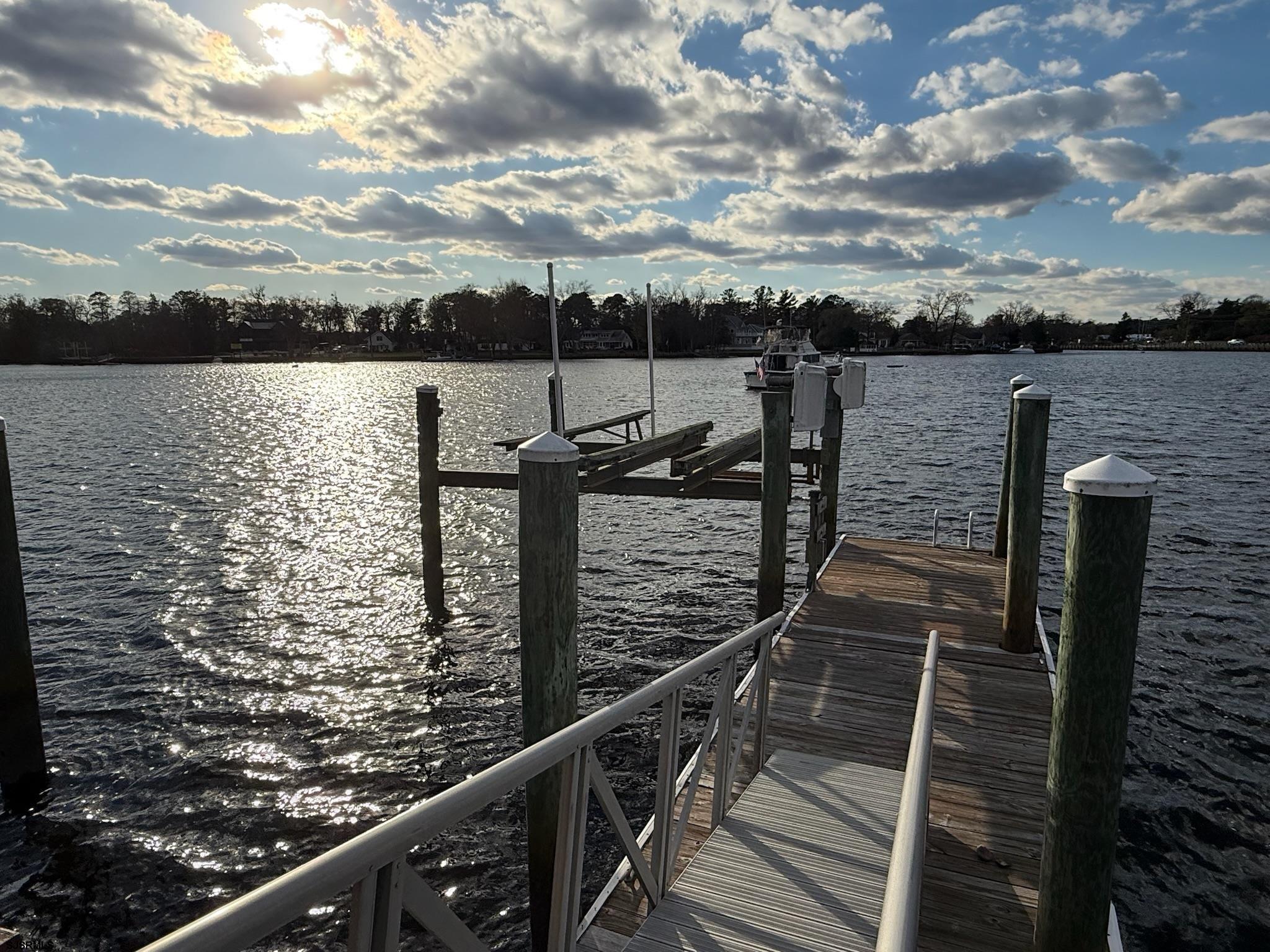 225 Old River Road Mays Landing, NJ 08330 - Photo 60 of 97 a view of a terrace with wooden floor and lake view