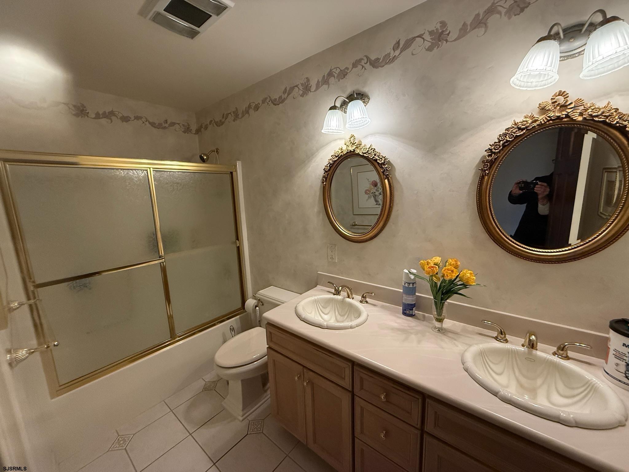 225 Old River Road Mays Landing, NJ 08330 - Photo 68 of 97 a bathroom with a toilet a sink and mirror