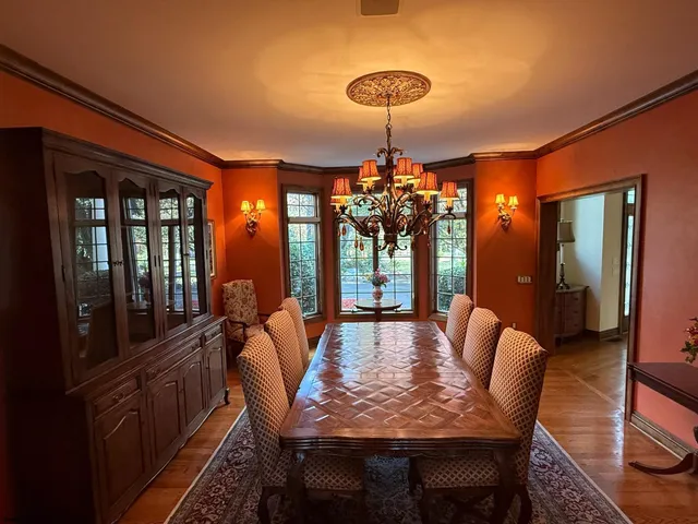 a room with a window and ceiling fan