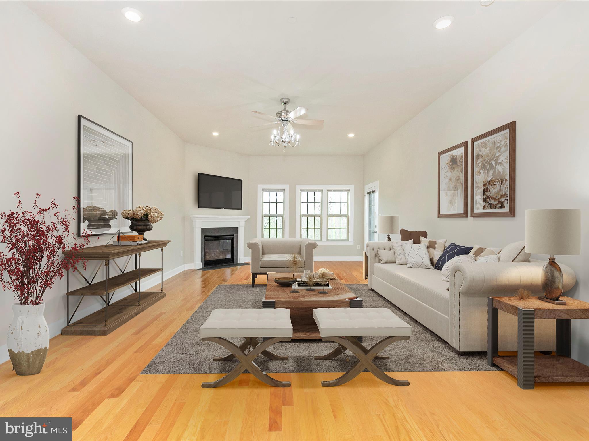 3838 Fulham Road Frederick, MD 21704 - Photo 12 of 51 a living room with furniture fireplace and a flat screen tv