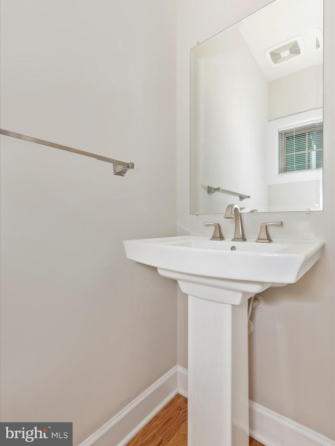 3838 Fulham Road Frederick, MD 21704 - Photo 14 of 51 a bathroom with a sink and a mirror