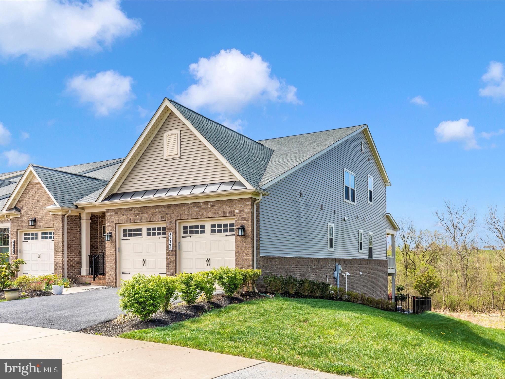 3838 Fulham Road Frederick, MD 21704 - Photo 31 of 51 a view of a house with a small yard and potted plants