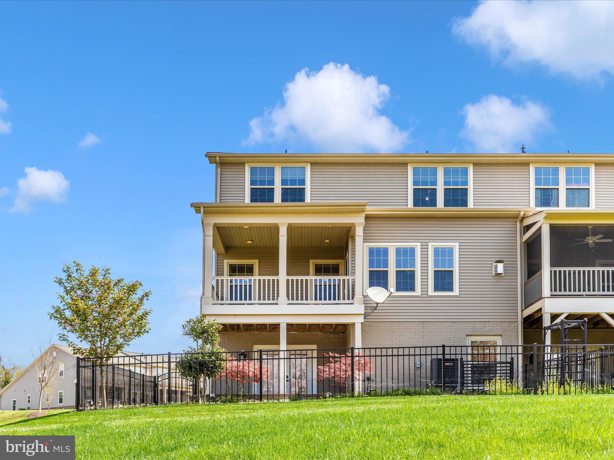 3838 Fulham Road Frederick, MD 21704 - Photo 32 of 51 a front view of a house with a yard