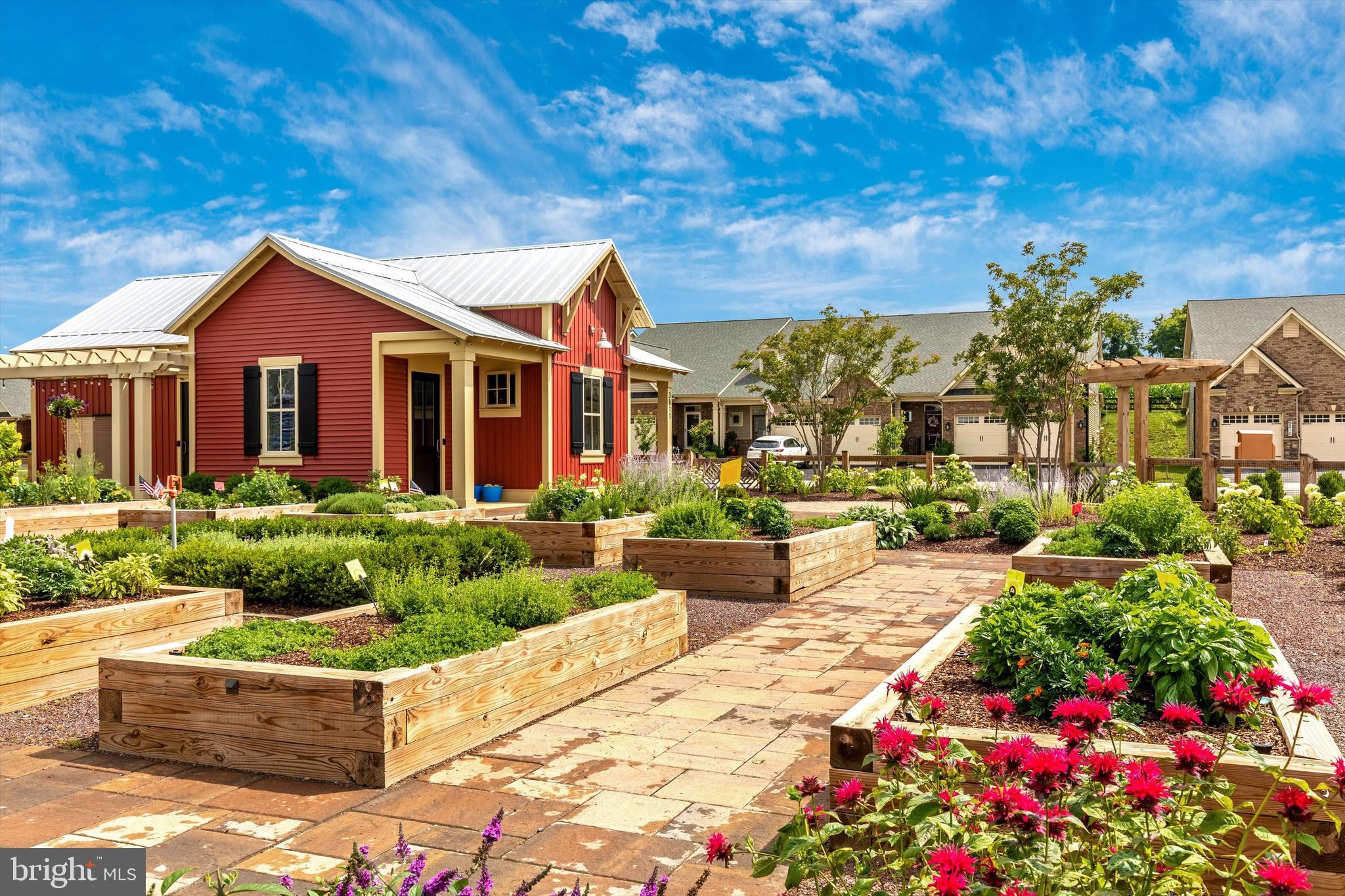 3838 Fulham Road Frederick, MD 21704 - Photo 42 of 51 a front view of a house with a garden