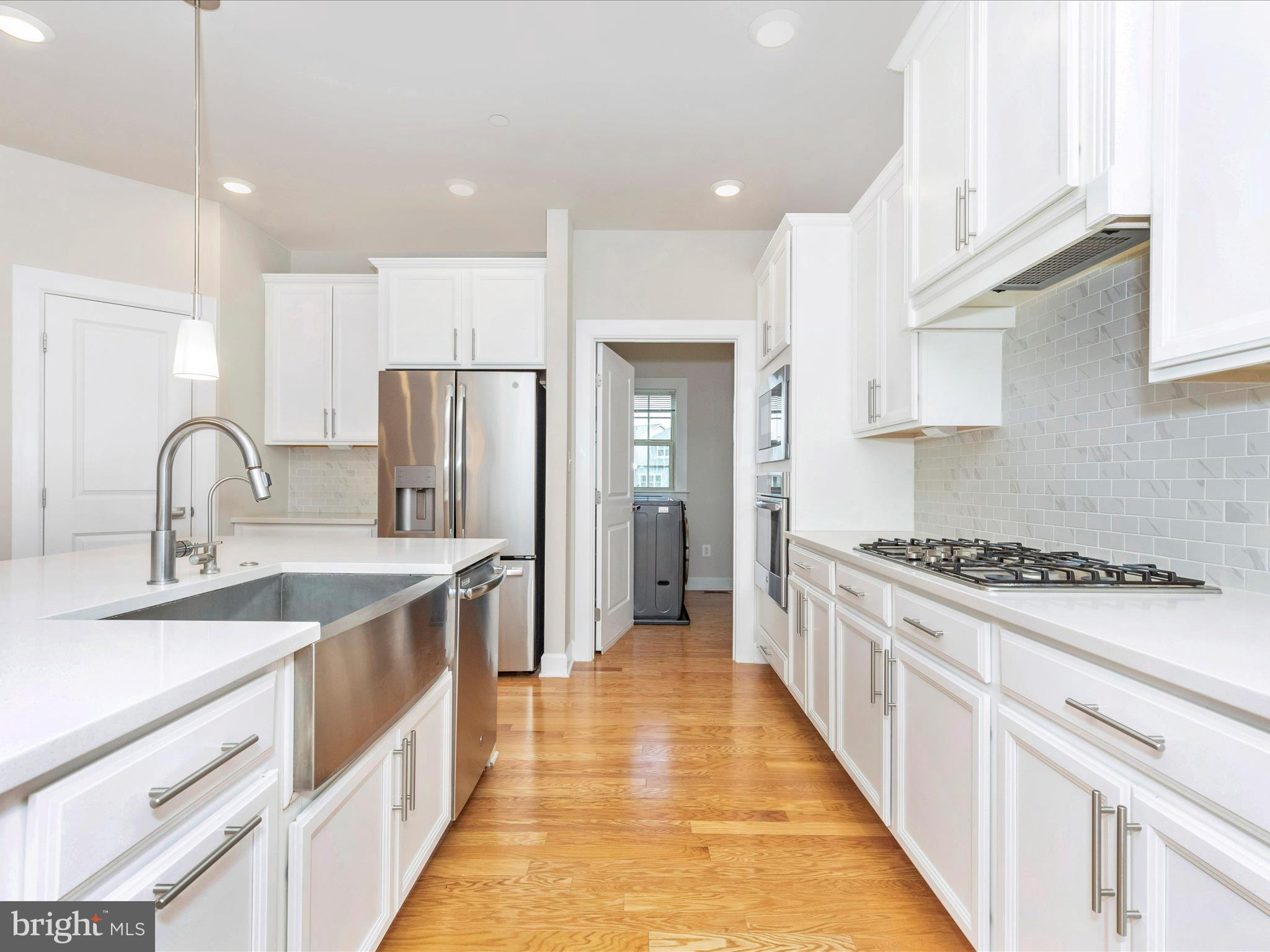 3838 Fulham Road Frederick, MD 21704 - Photo 8 of 51 a kitchen with stainless steel appliances granite countertop a sink stove and refrigerator