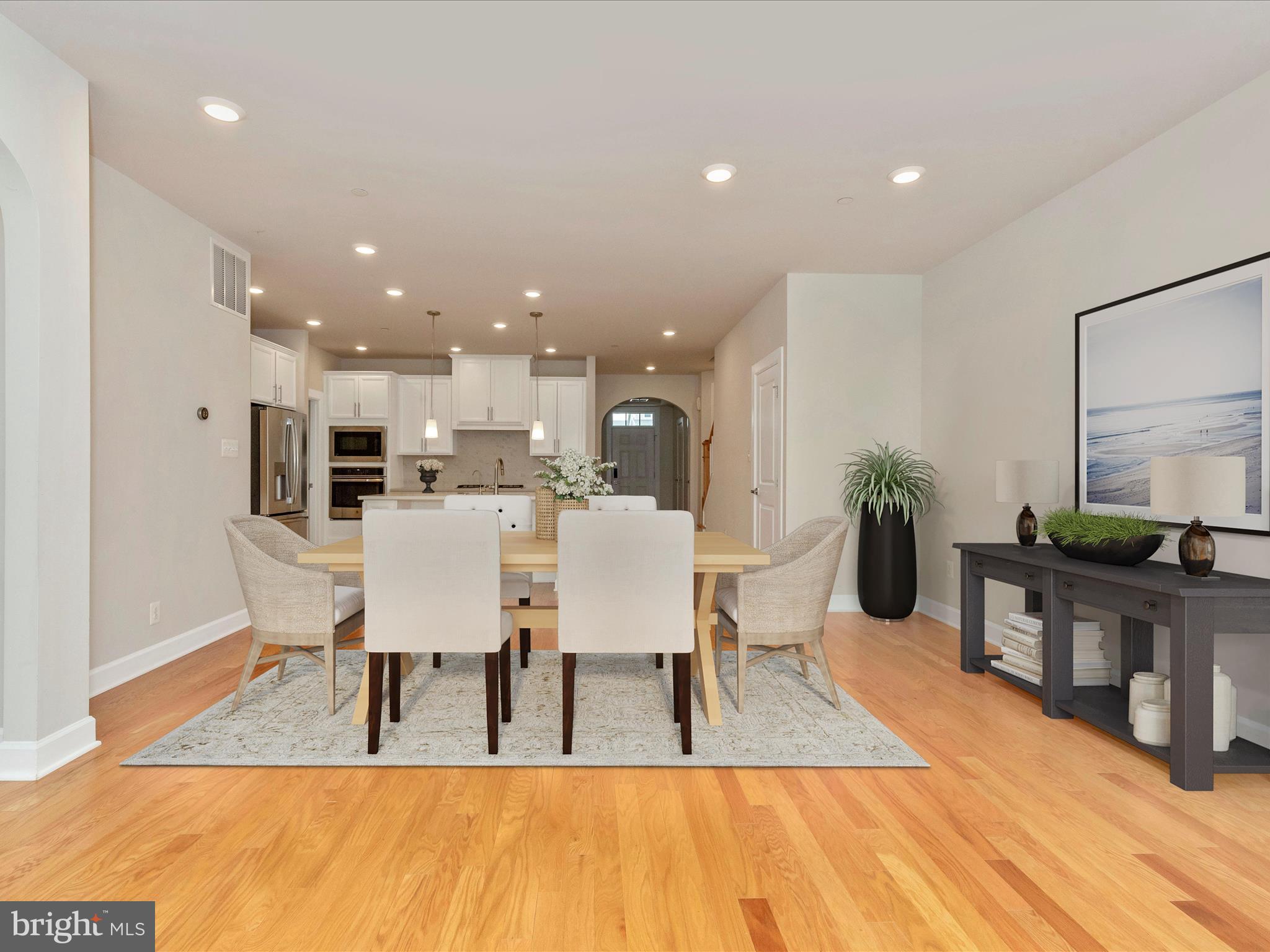 3838 Fulham Road Frederick, MD 21704 - Photo 10 of 51 a view of a dining room with furniture and wooden floor