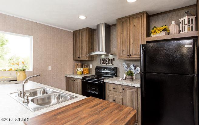 9817 Ridge Road Northeast Navassa, NC 28451 - Photo 7 of 17 11