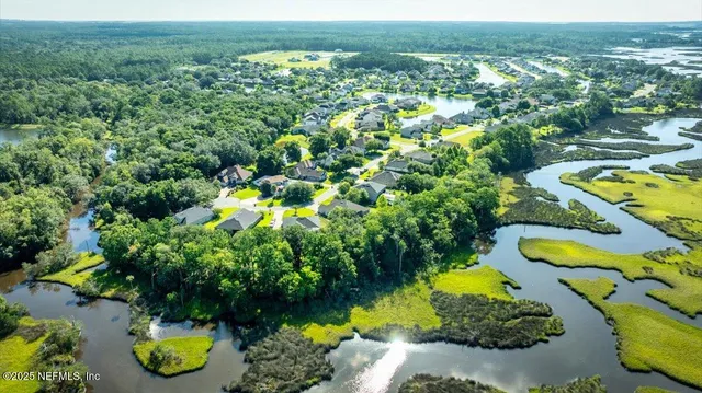 a view of a swimming pool with a garden