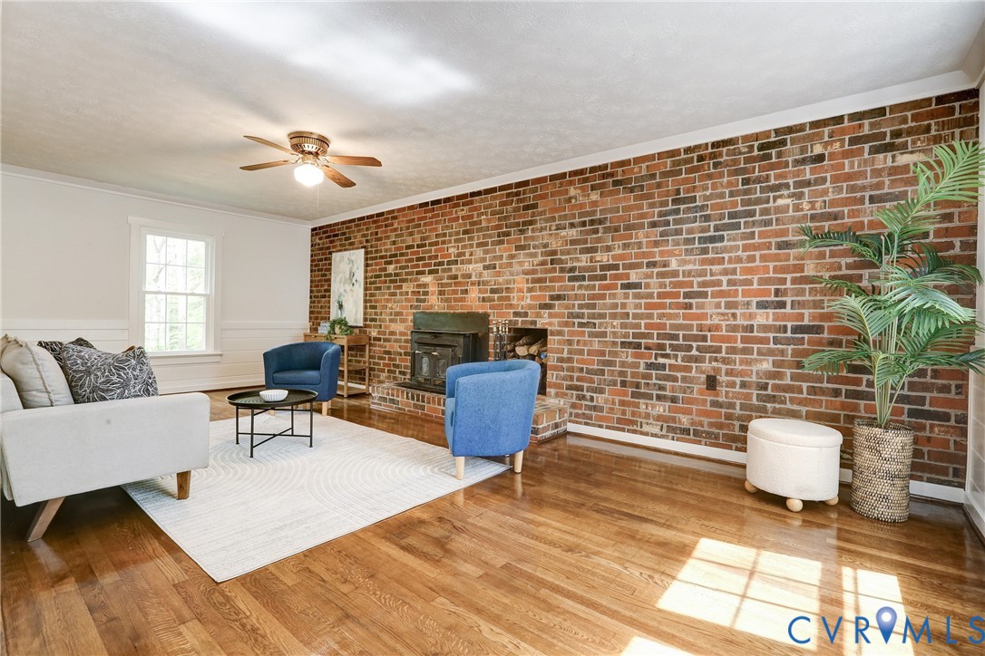 661 Greencastle Road Chesterfield, VA 23236 - Photo 6 of 28 a living room with furniture and a rug