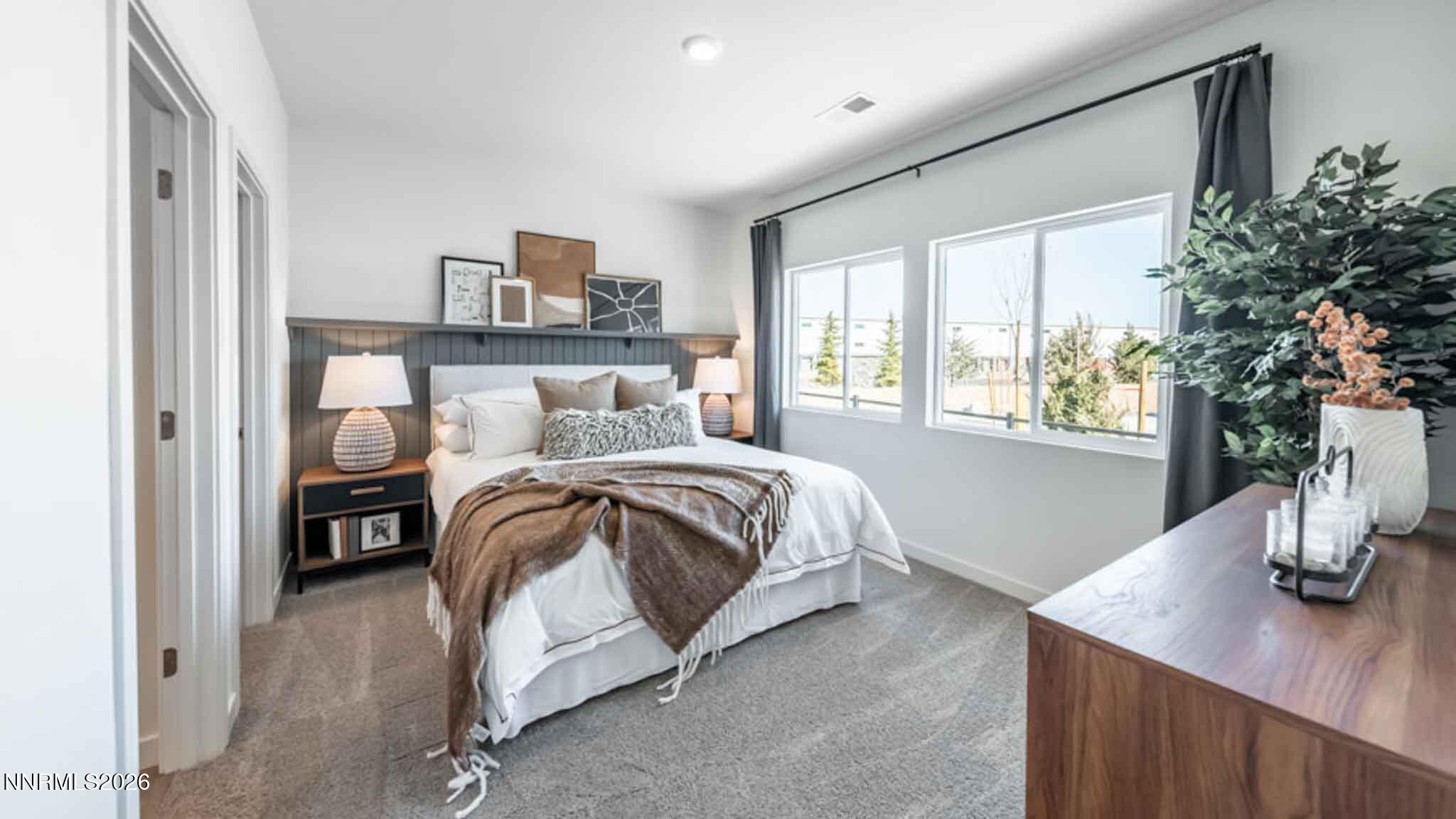 8423 Redwood Dawn Drive Reno, NV 89506 - Photo 9 of 14 a bedroom with a bed and window