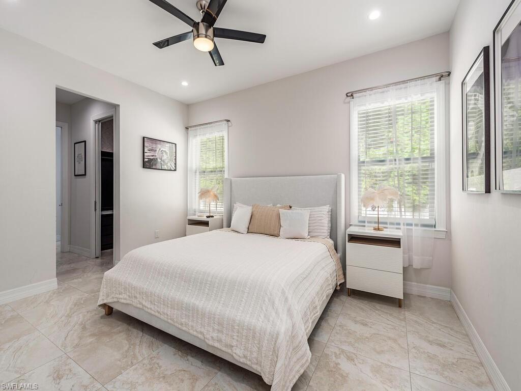 1021 Creech Road Naples, FL 34103 - Photo 6 of 12 Bedroom featuring a ceiling fan, recessed lighting, and connected bathroom