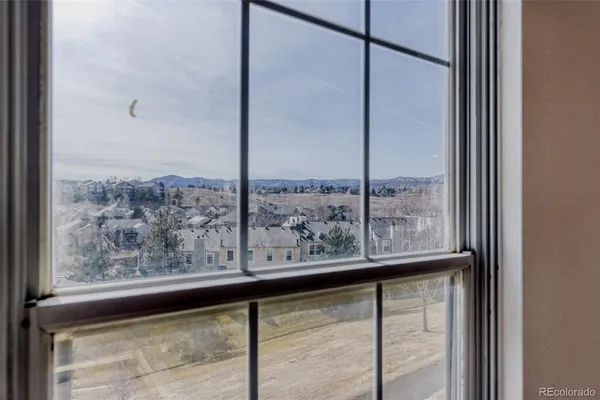 a view of a room with a window