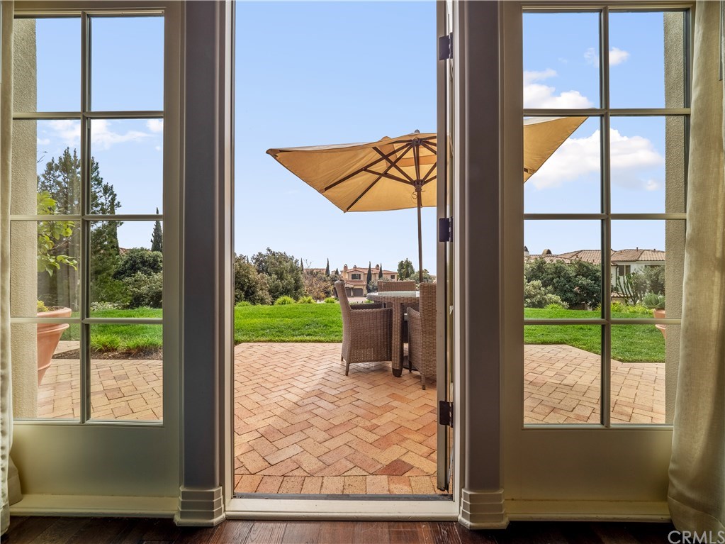 French door leading from great room to spacious patio with an ocean view.