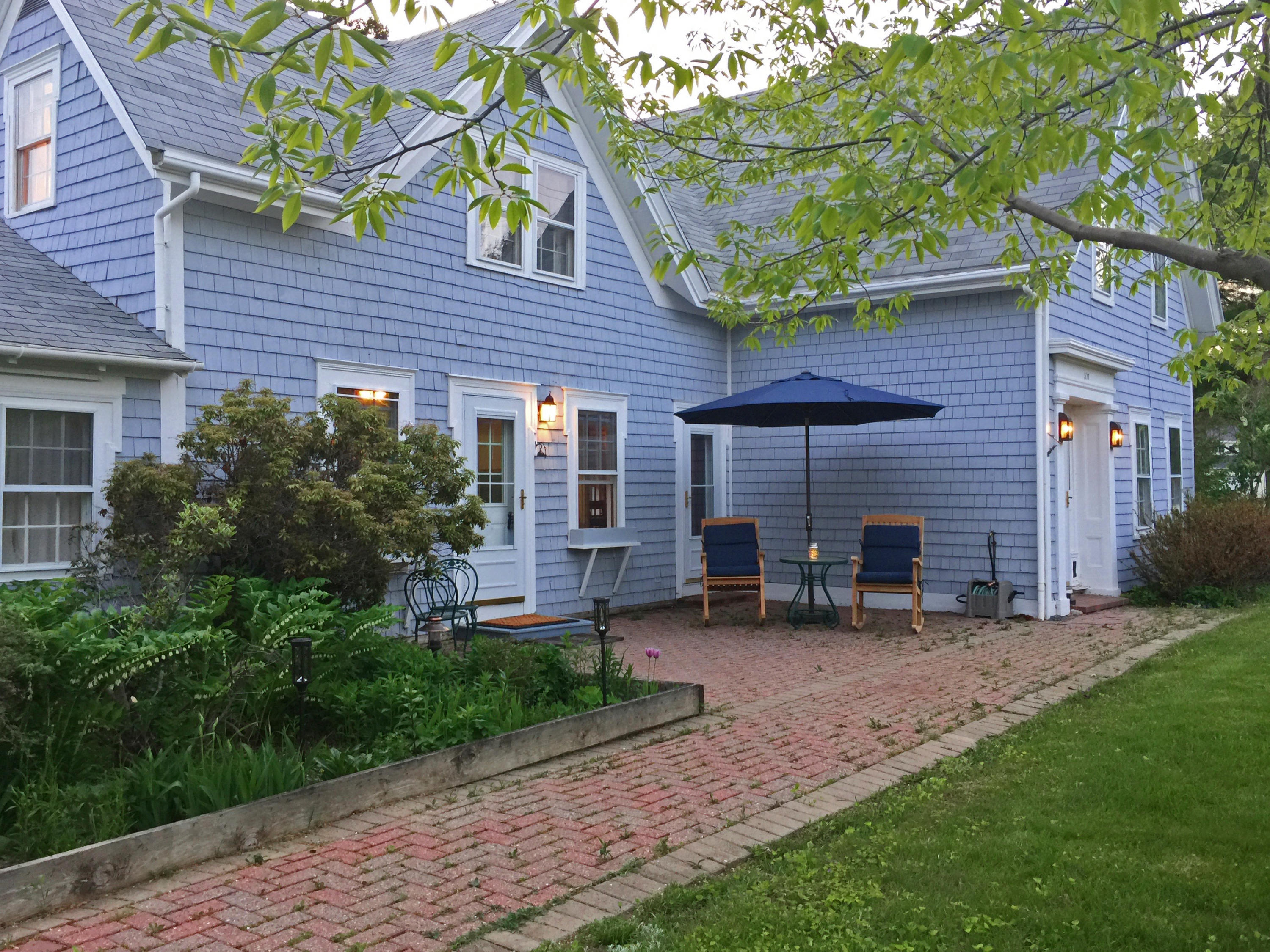 577 Newbury Neck Road Surry, ME 04684 - Photo 1 of 57 Exterior Fron Patio Green