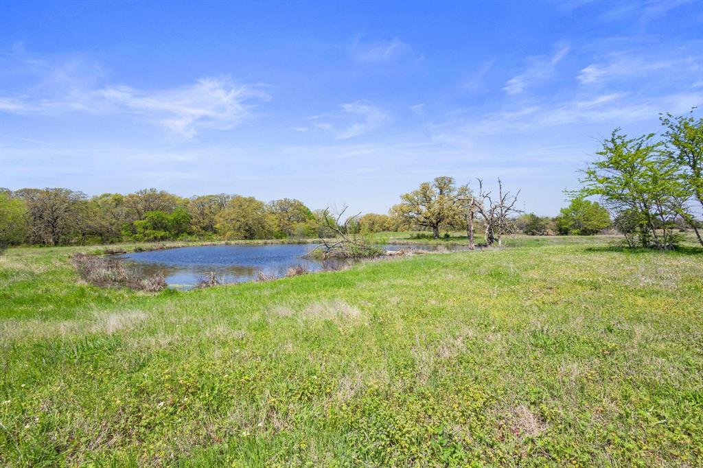 Tbd Hog Town Road Collinsville, TX 76233 - Photo 15 of 20 a view of a lake with houses in the back