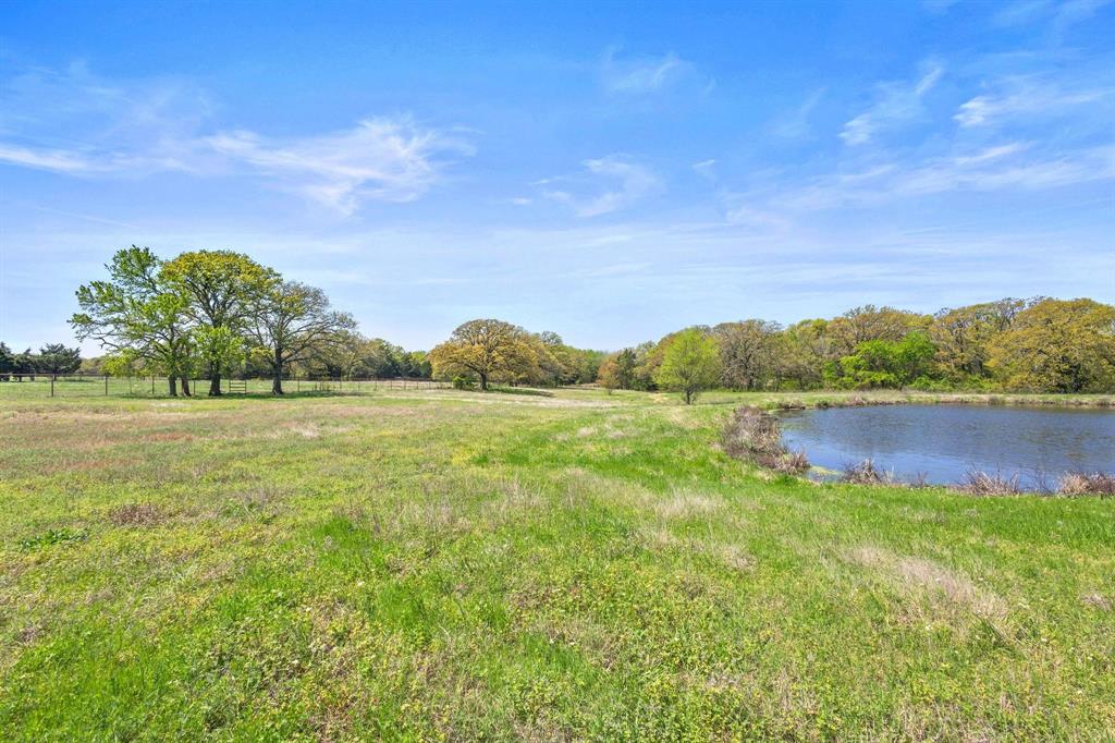 Tbd Hog Town Road Collinsville, TX 76233 - Photo 17 of 20 a view of a lake with houses in the back