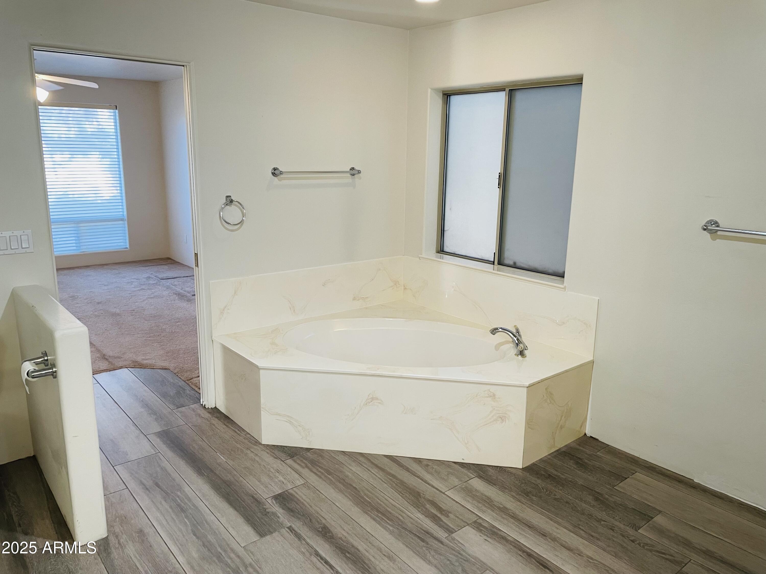 80 Stone Way Sedona, AZ 86351 - Photo 12 of 20 a bathroom with a tub and mirror