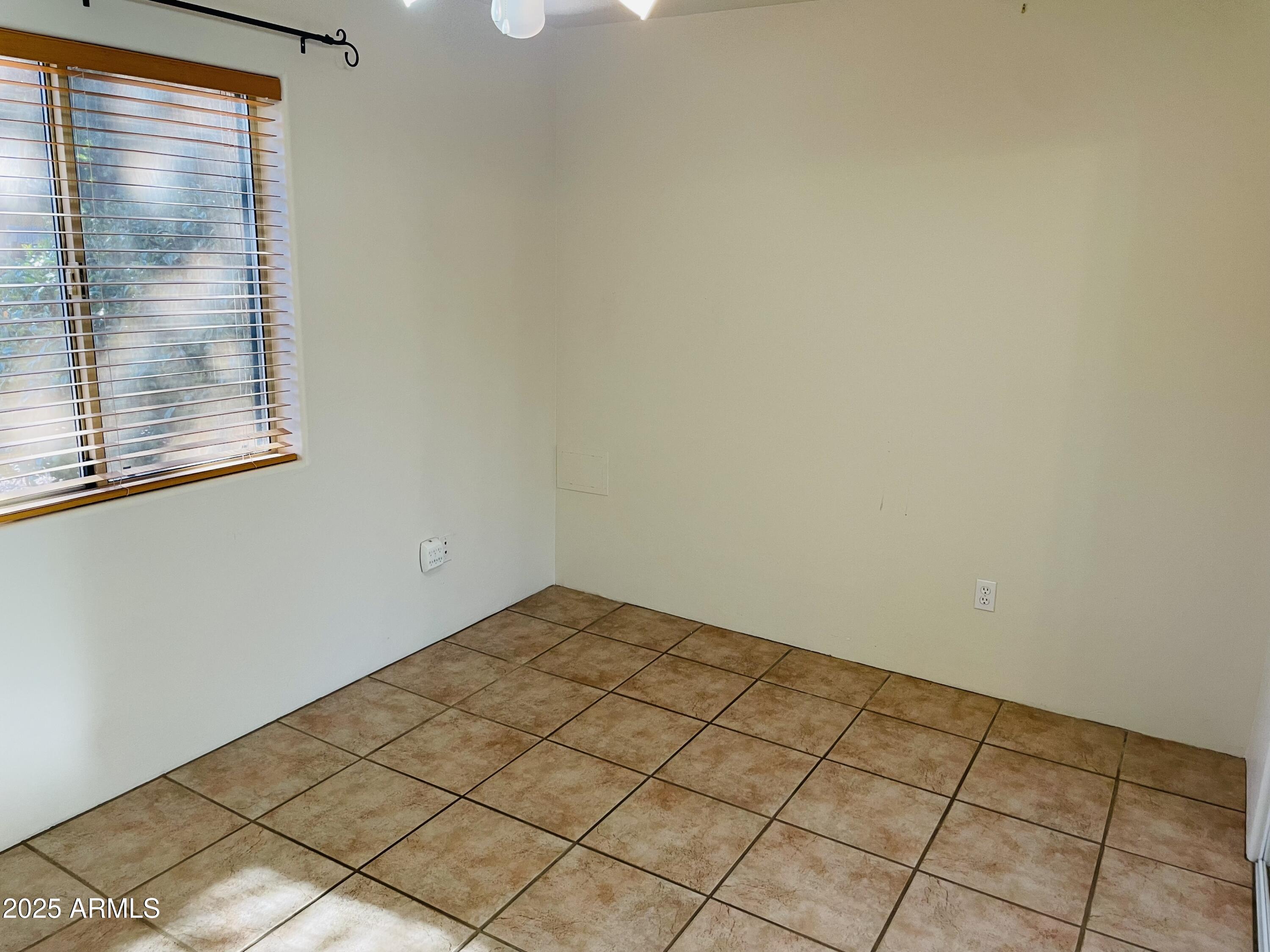 80 Stone Way Sedona, AZ 86351 - Photo 16 of 20 a view of a small space with wooden floor and a window