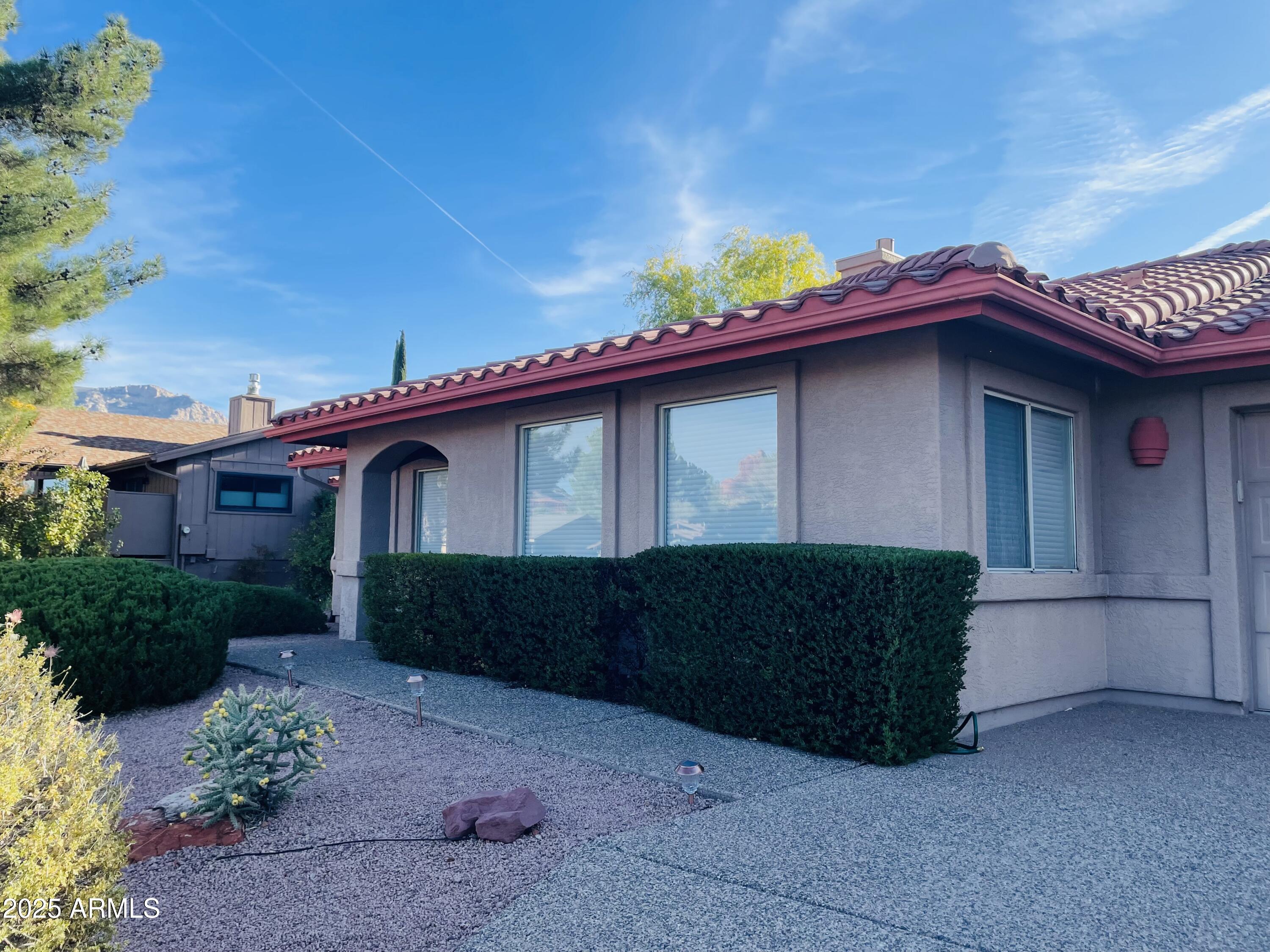 80 Stone Way Sedona, AZ 86351 - Photo 3 of 20 a front view of a house
