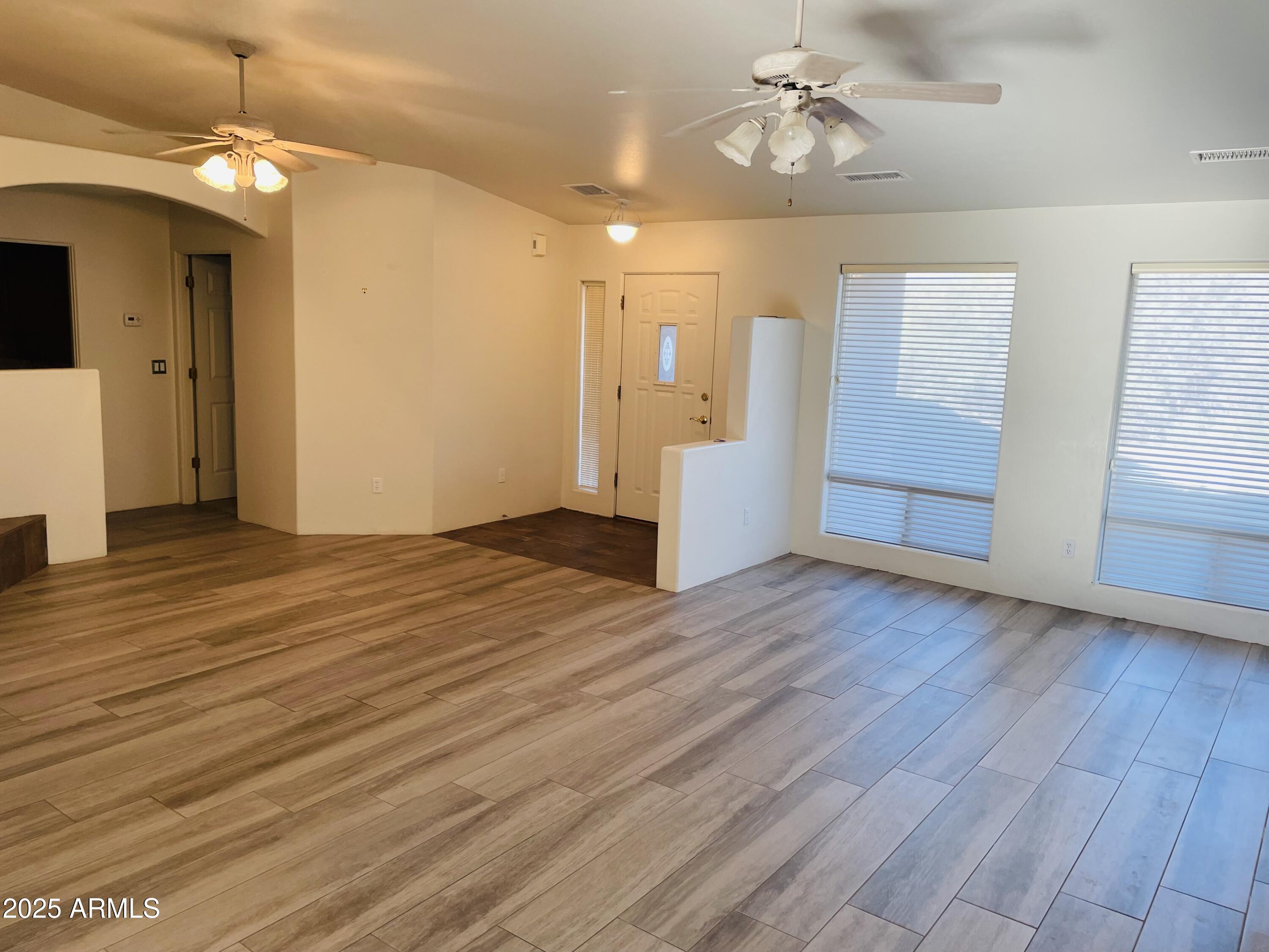 80 Stone Way Sedona, AZ 86351 - Photo 6 of 20 wooden floor in an empty room with a window