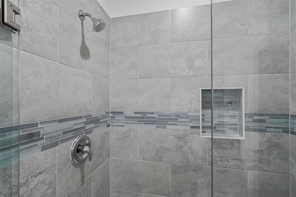 6059 Rivendell Drive Frisco, TX 75035 - Photo 24 of 30 a bathroom with a shower