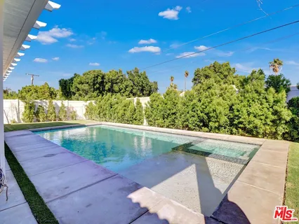 a view of a balcony with an outdoor space