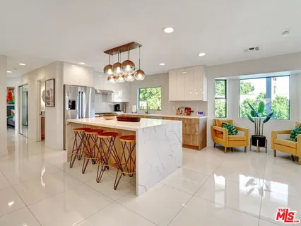a kitchen with a sink and counter top space