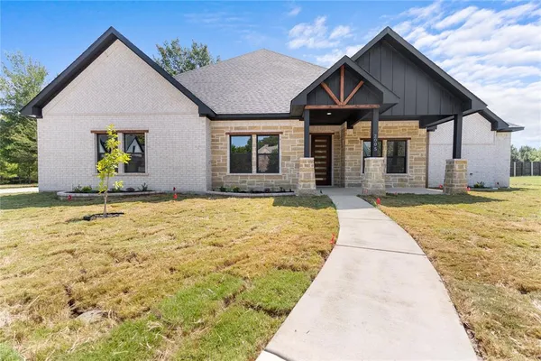 a front view of house with yard