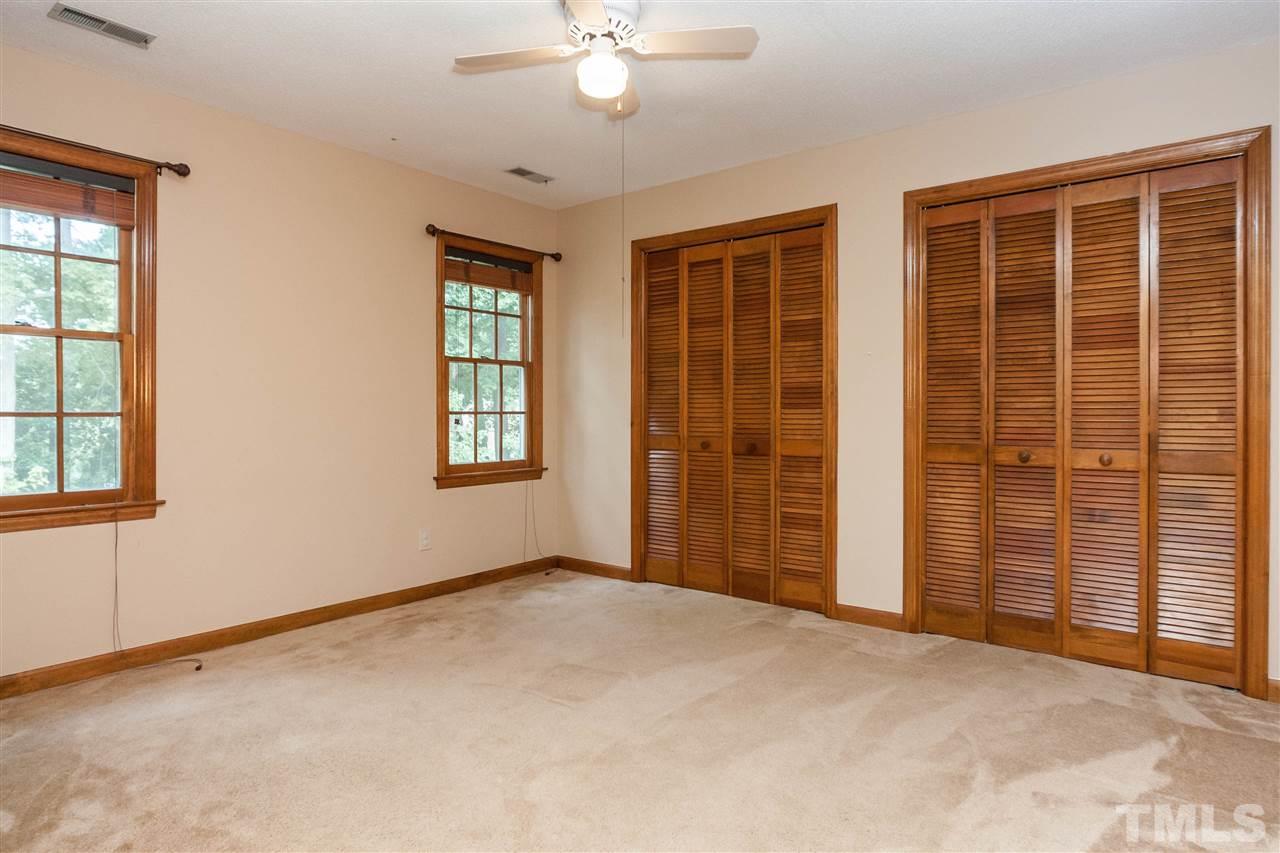 7205 Sawbuck Court Raleigh, NC 27613 - Photo 18 of 25 a view of an empty room with a window