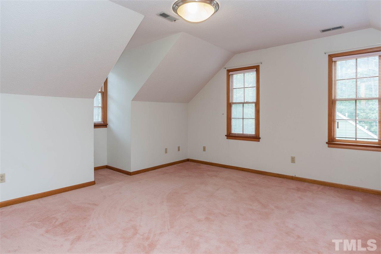 7205 Sawbuck Court Raleigh, NC 27613 - Photo 21 of 25 an empty room with windows and closet