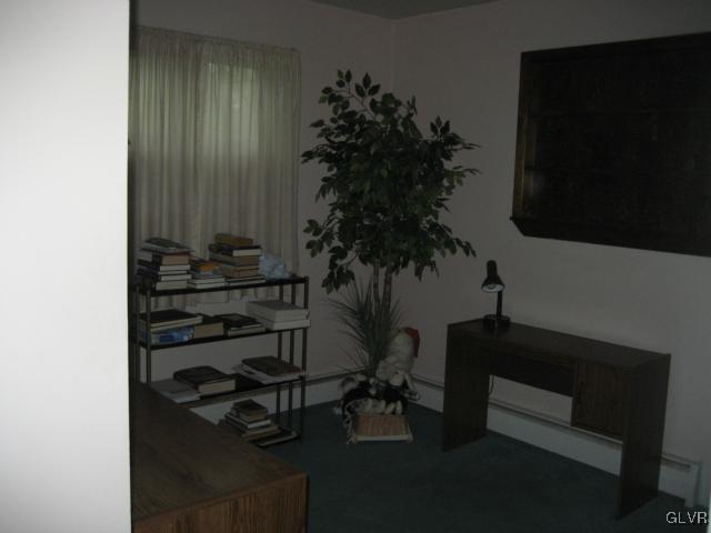 6 Ridgewood Road Easton, PA 18045 - Photo 12 of 20 a room with a potted plant on a table and a potted plant