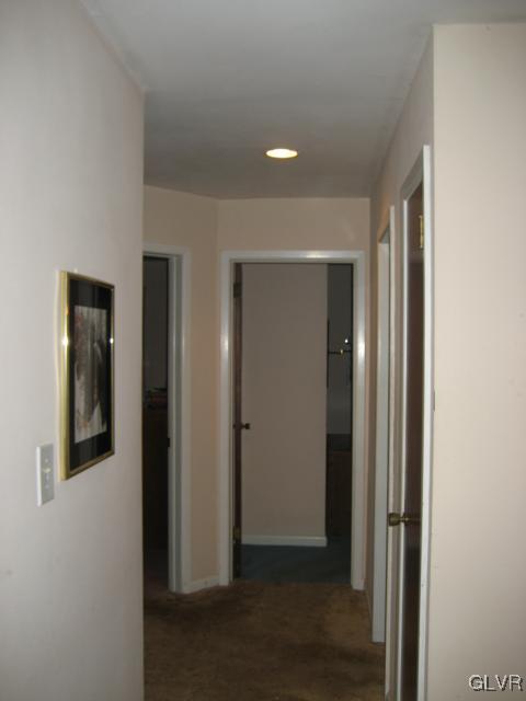 6 Ridgewood Road Easton, PA 18045 - Photo 14 of 20 a view of a hallway with wooden shelves