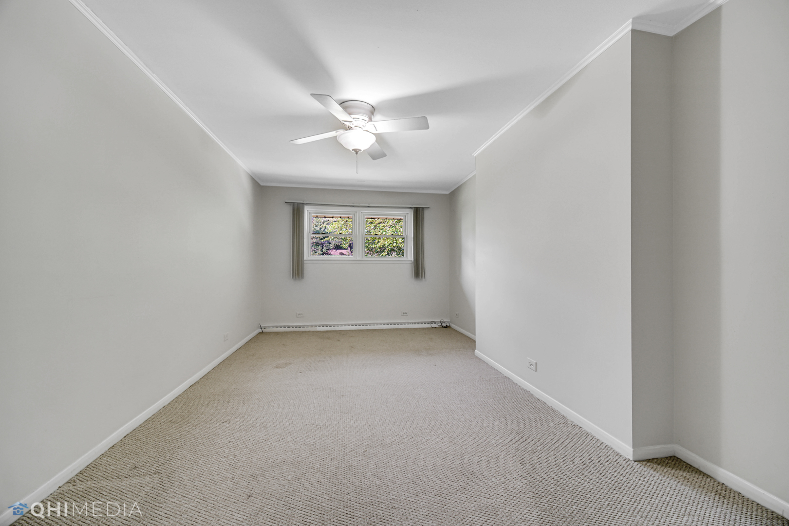 2224 Parkside Drive Park Ridge, IL 60068 - Photo 11 of 26 an empty room with a window and a fan