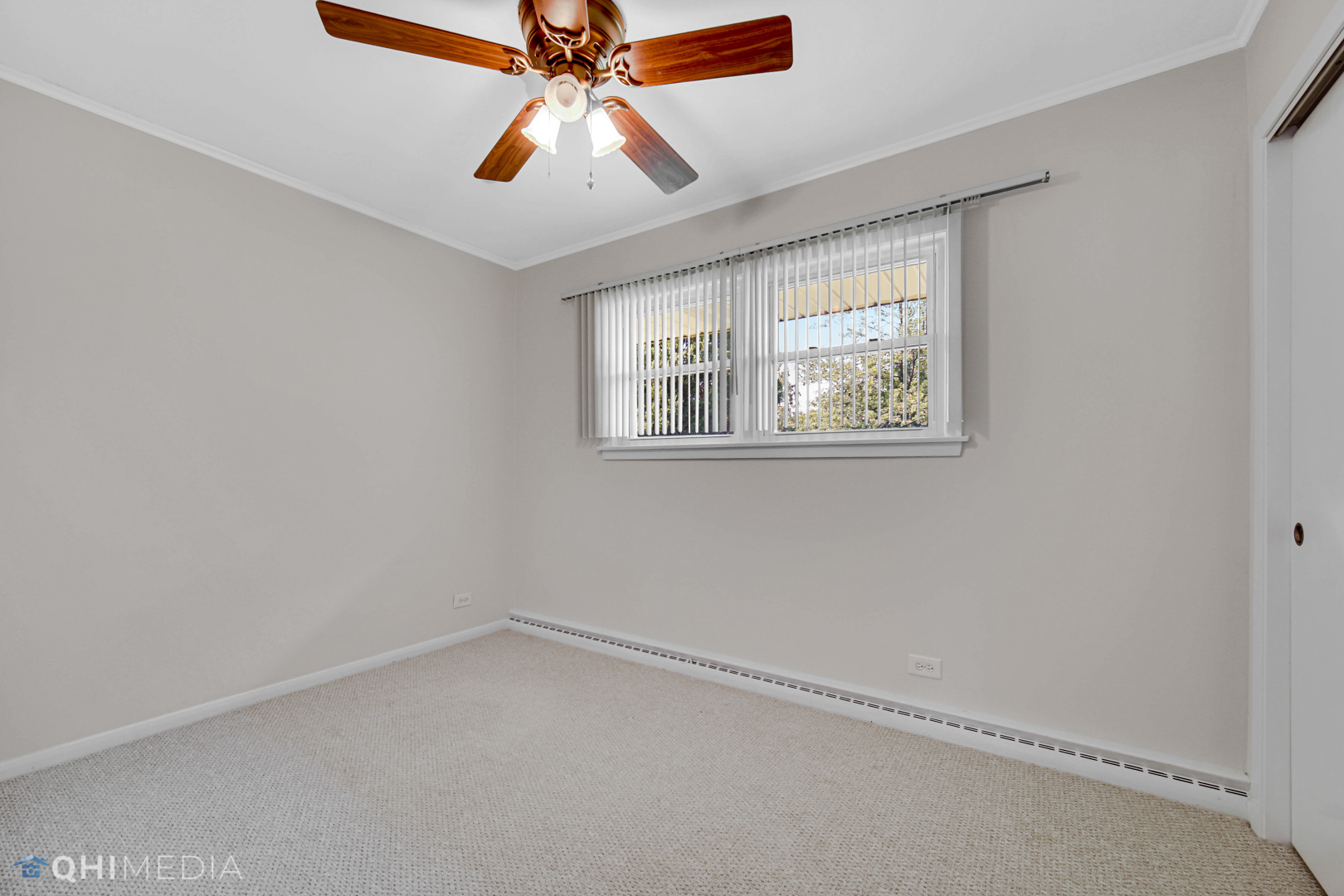 2224 Parkside Drive Park Ridge, IL 60068 - Photo 15 of 26 an empty room with windows and fan