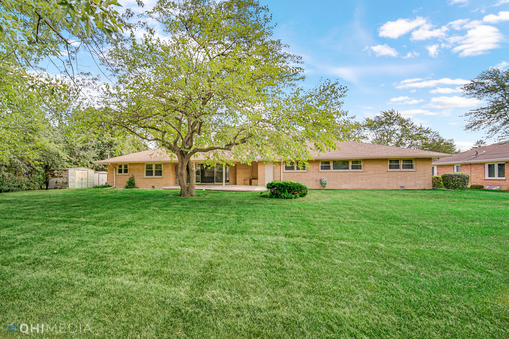2224 Parkside Drive Park Ridge, IL 60068 - Photo 25 of 26 a front view of a house with a yard and trees