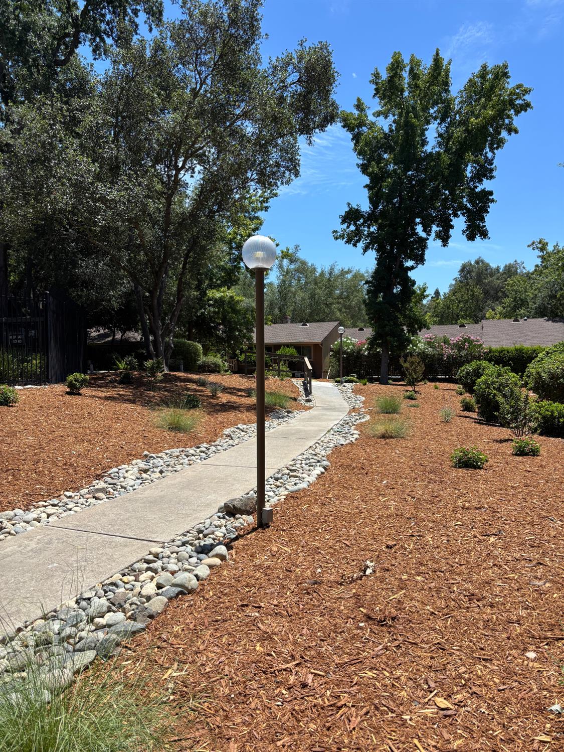 7029 Rio Cuarto Court Citrus Heights, CA 95621 - Photo 23 of 36 Walkway to the nearest pool and office