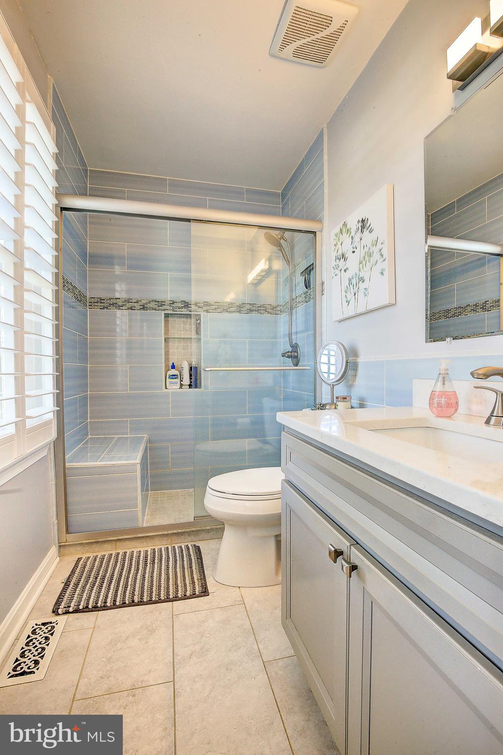 602 Riden Street Odenton, MD 21113 - Photo 21 of 38 Owner's bath, beautiful tile and seat in shower