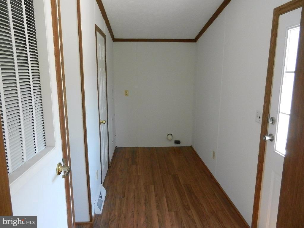 22431 Cross Road Chestertown, MD 21620 - Photo 17 of 24 Laundry room with half bath to the left