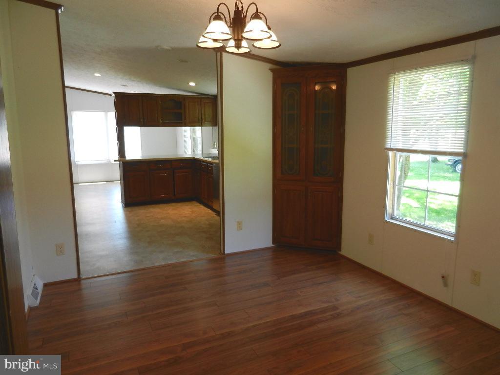 22431 Cross Road Chestertown, MD 21620 - Photo 19 of 24 Separate dining with built in corner cabinets