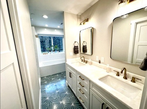 2007 Manana Street Austin, TX 78730 - Photo 15 of 38 Full bathroom with double vanity, washtub / shower combination, dark flooring, and recessed lighting