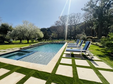 2007 Manana Street Austin, TX 78730 - Photo 37 of 38 View of pool with a lawn, a pool with connected hot tub, and a patio area