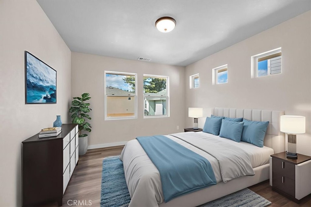 8393 Amapoa Atascadero, CA 93422 - Photo 18 of 23 a bedroom with bed window and wall painting