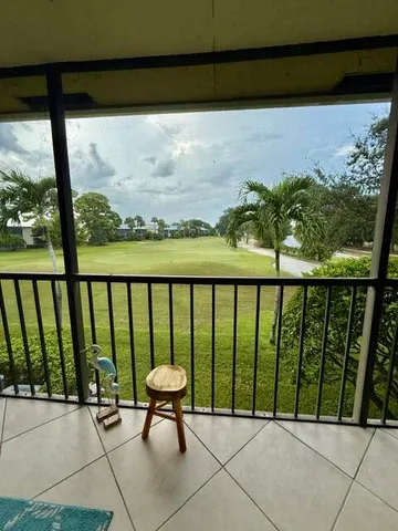 a view of a two chair in the balcony