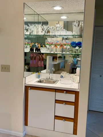 a room with counter and cabinets