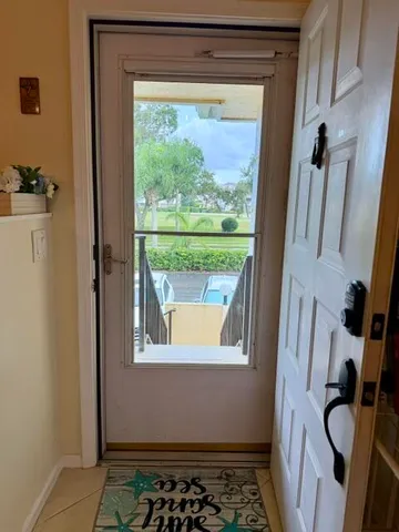 a bathroom with a sink and a window