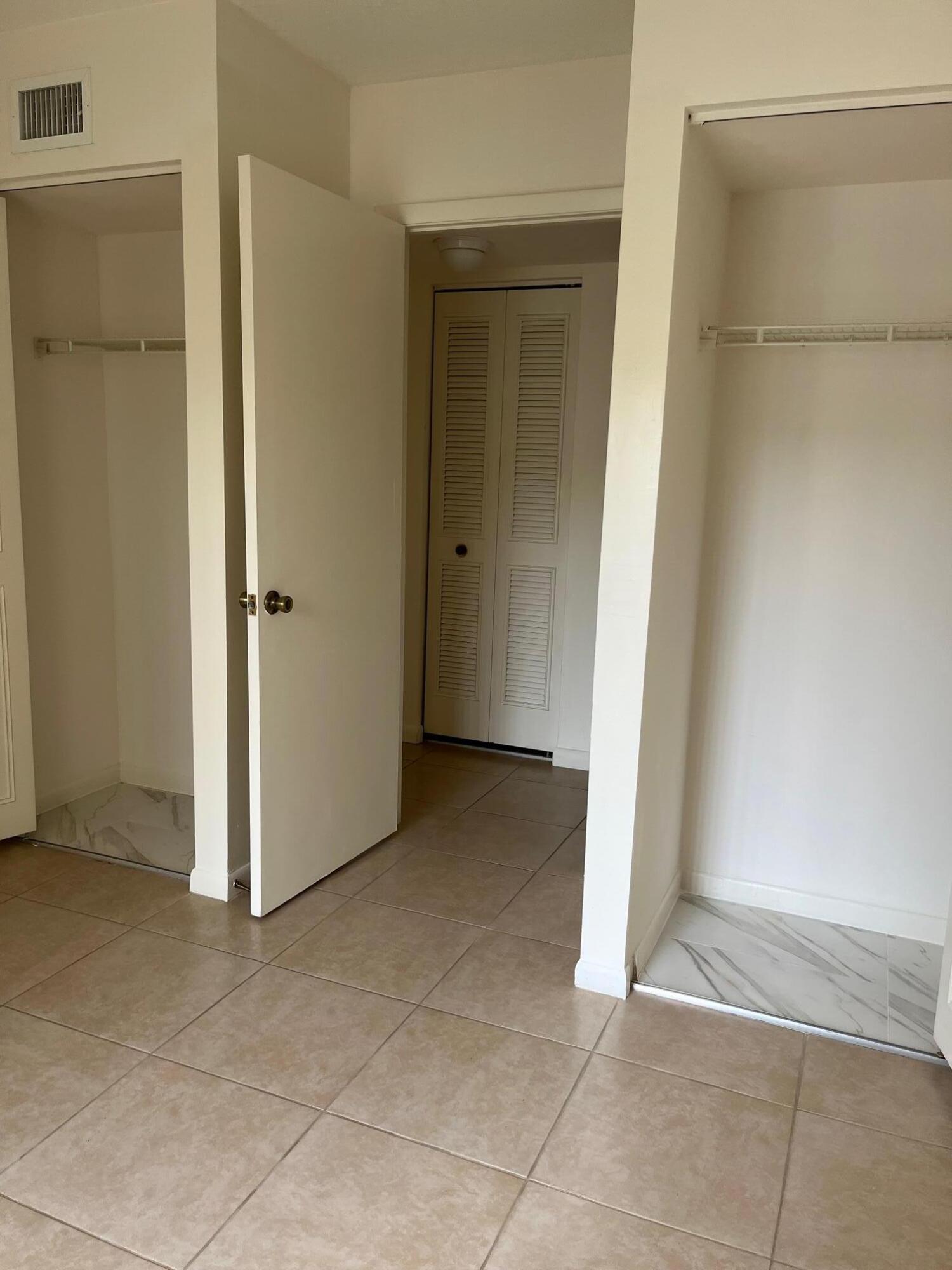 801 Sky Pine Way, Unit B1 Greenacres, FL 33415 - Photo 9 of 17 a view of an empty room