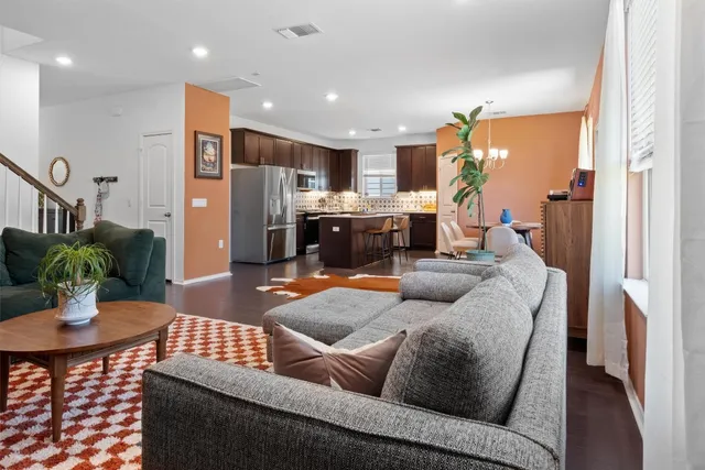 a kitchen with stainless steel appliances wooden cabinets and a counter top space